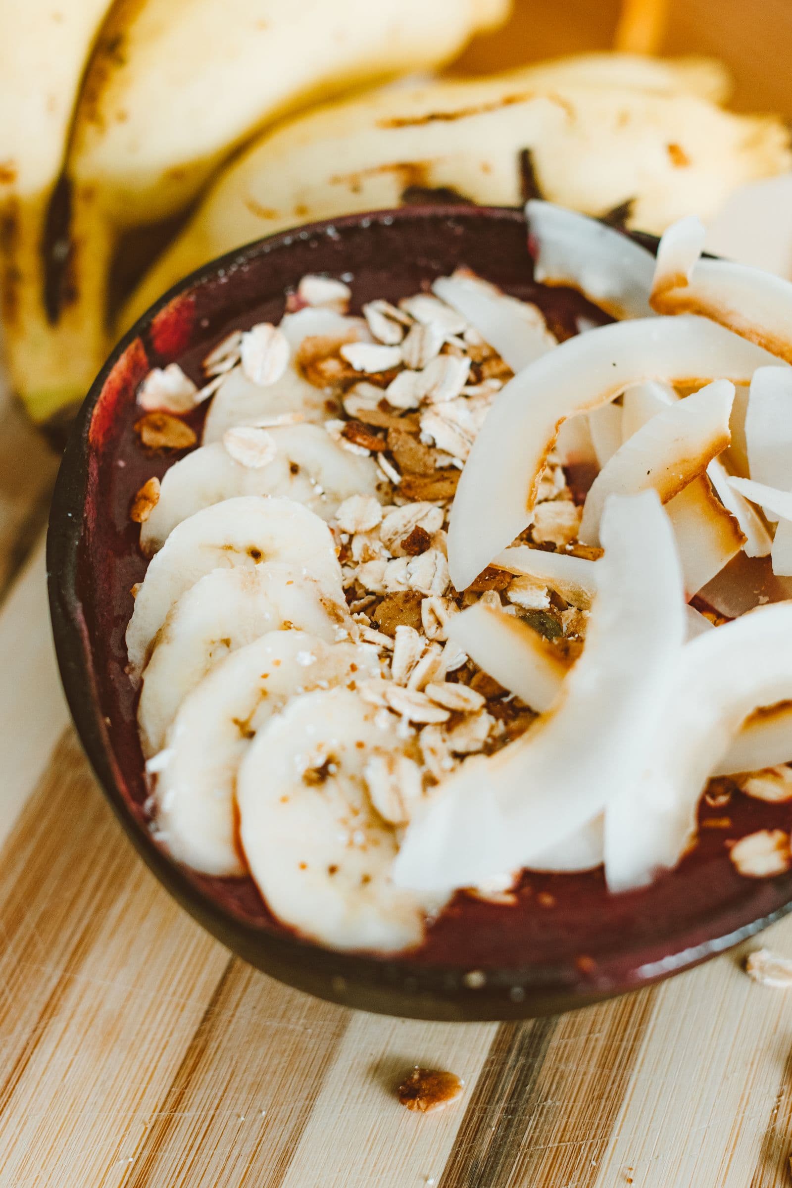 Açaí bowl with banana, coconut and seeds. Photo by ROMAN ODINTSOV (Pexels)
